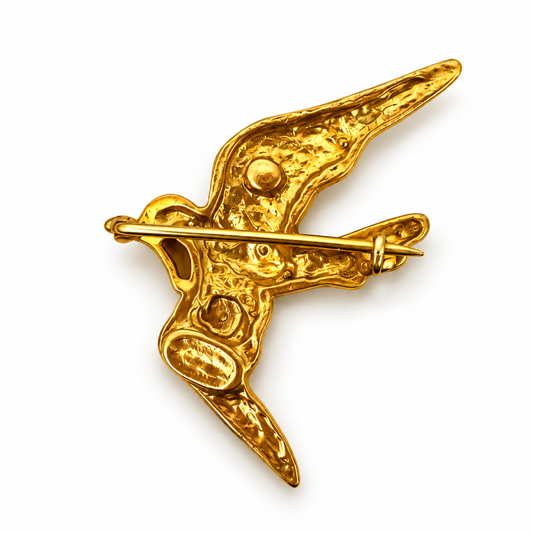 Back view of Bote A Mano 24K gold-plated bird brooch with pin fastening