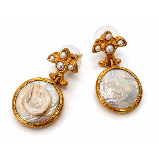 detailed view of 24K gold-plated mother of pearl earrings showing handcrafted texture and lightweight drop design by Bote A Mano.