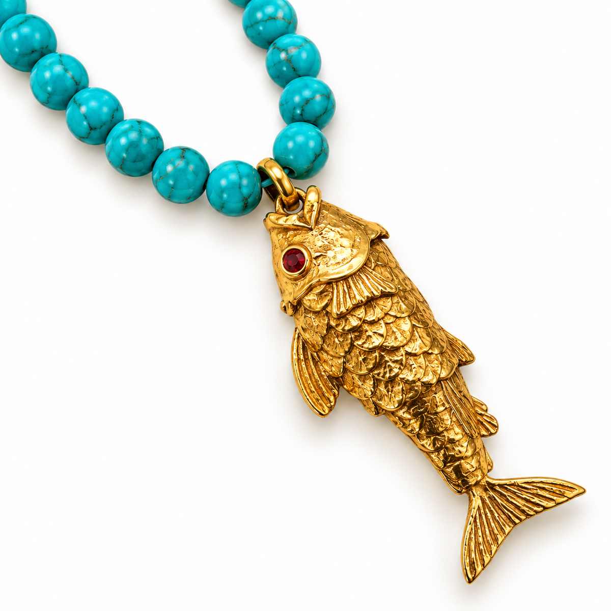 Close-up of turquoise necklace showing 0.5 cm beads and gold-plated pendant with red accent