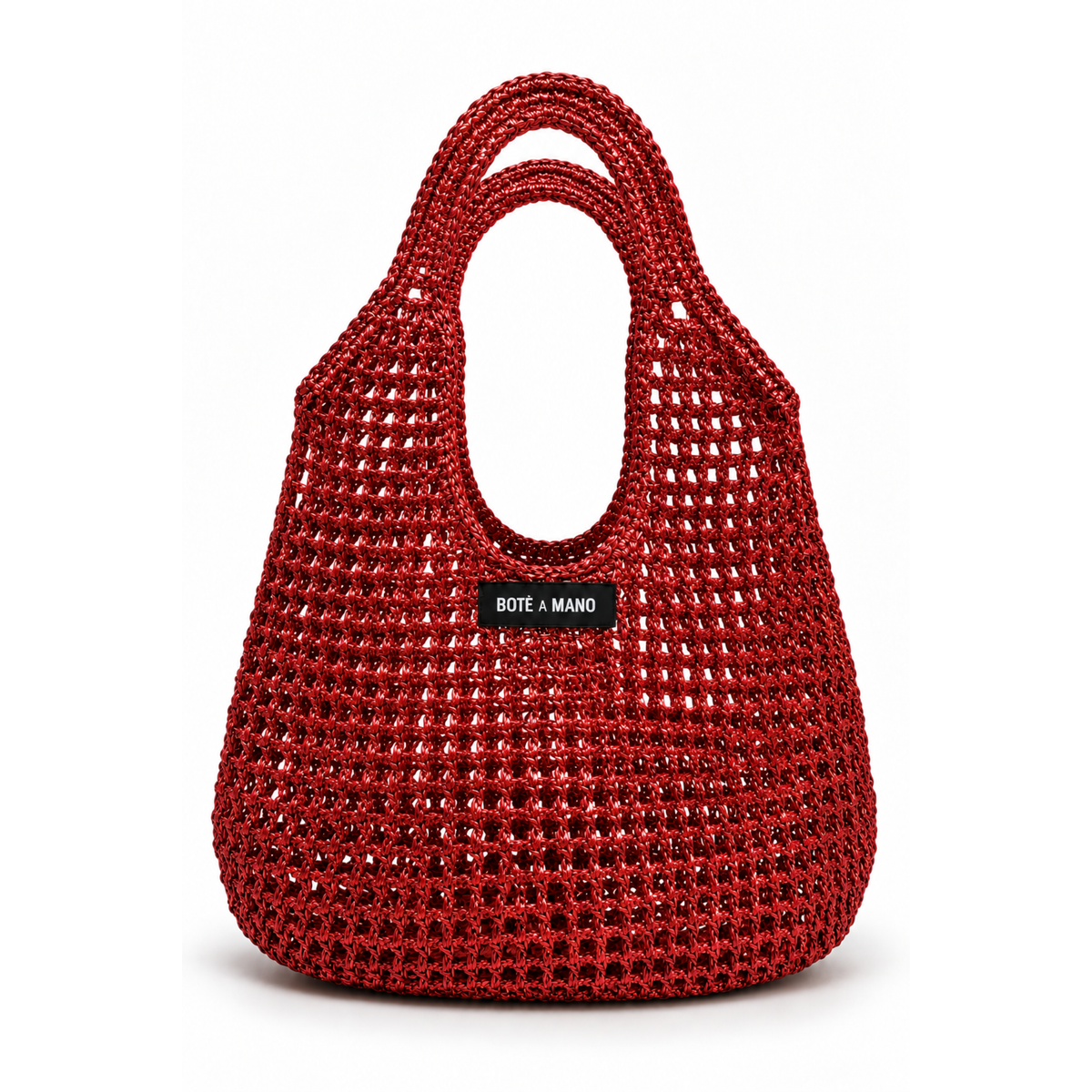 Red woven handbag with 'Bote a Mano' branding on a white background