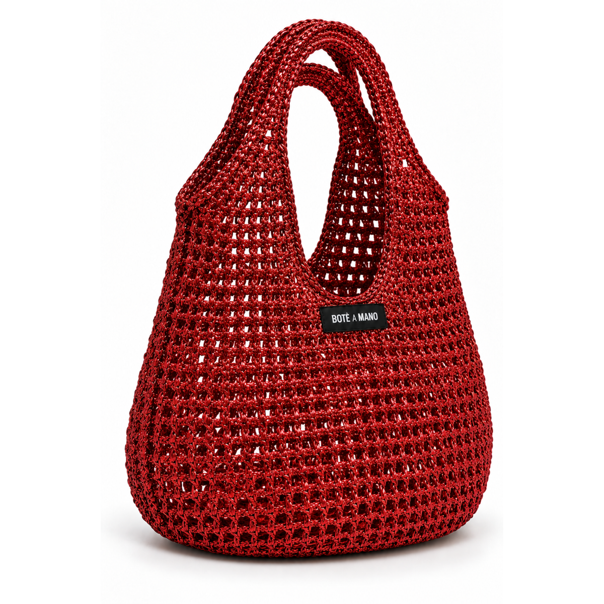 Side profile of the structured Burgundy raffia top handle handbag as a chic red fall accessory, highlighting its silhouette.