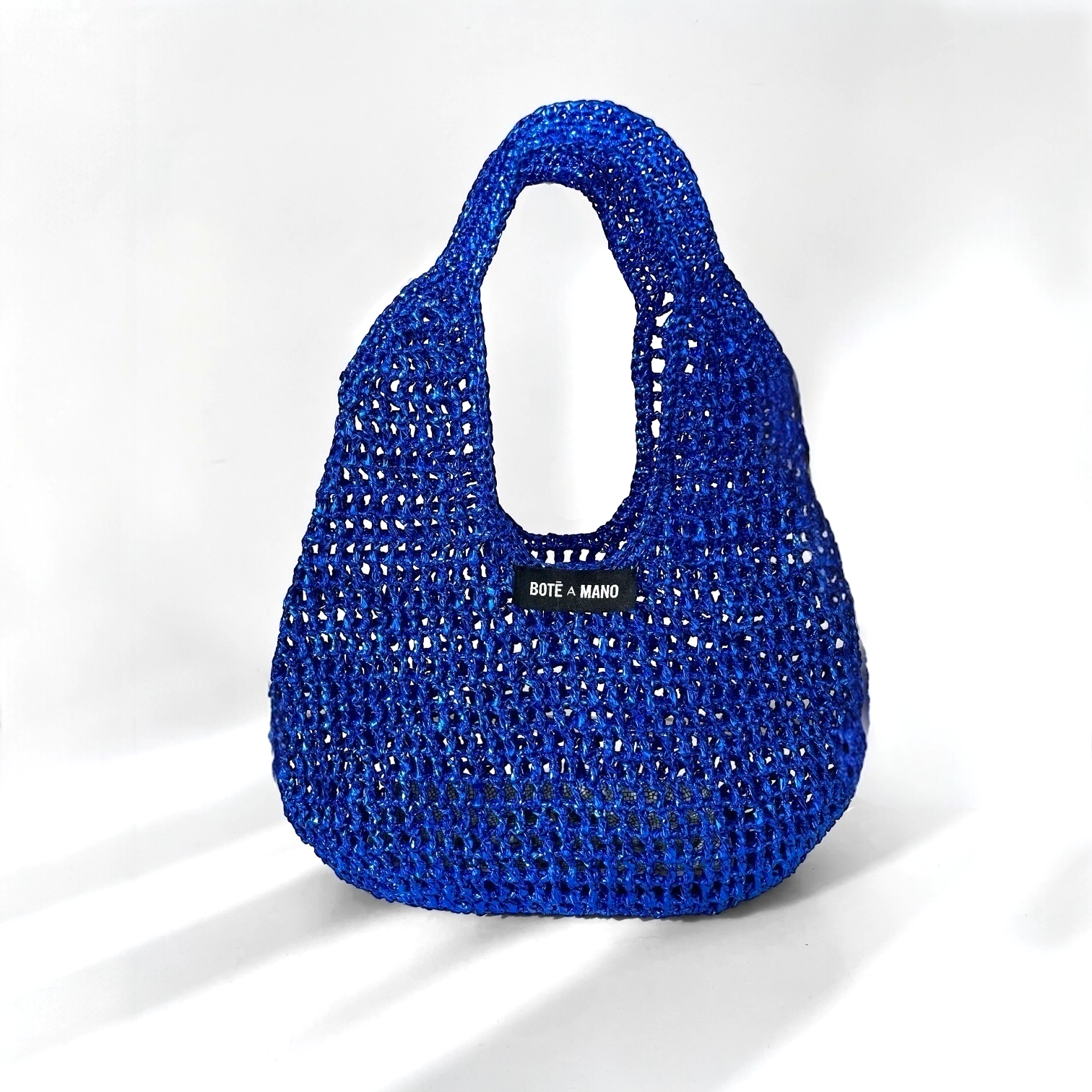 Handcrafted Royal Blue Metallic Bag with Elegant Top Handle and Open Interior
