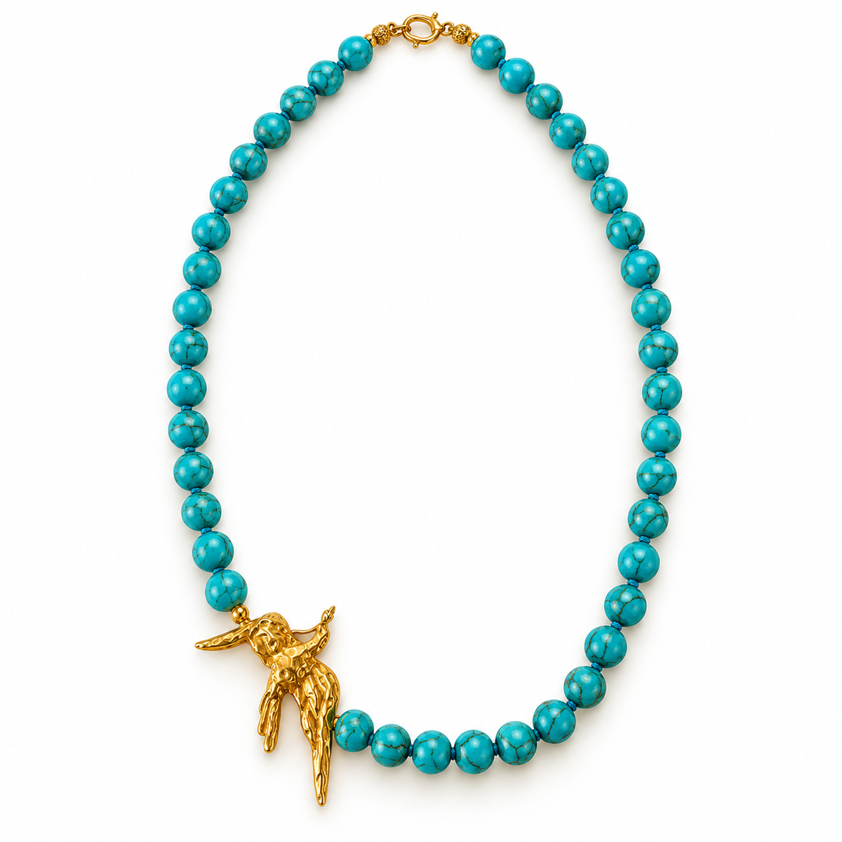 Turquoise beaded necklace with 24K gold-plated bird pendant by Bote A Mano
