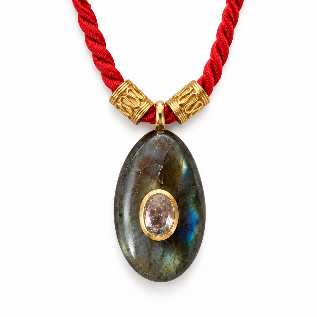 Close-up of natural Labradorite pendant with 24K gold-plated detail on a red cord necklace