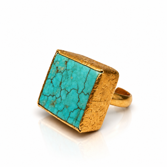 Natural Turquoise statement ring with textured 24K gold-plated setting by Bote A Mano