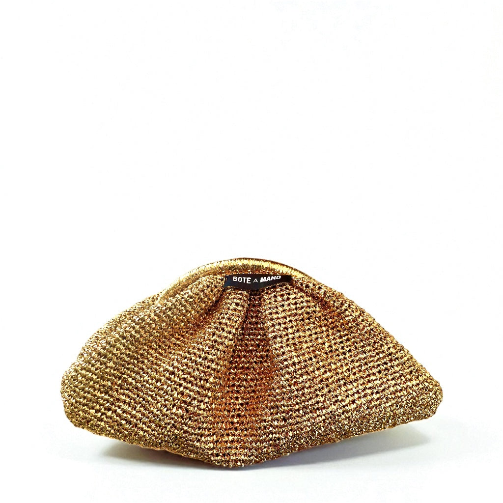 Close-up of the textured metallic gold raffia clutch showing the fine Italian weave and premium craftsmanship.