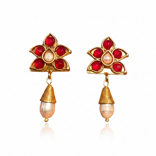 Front view of pearl and red ruby drop earrings by Bote A Mano, 24K gold-plated with handcrafted design.