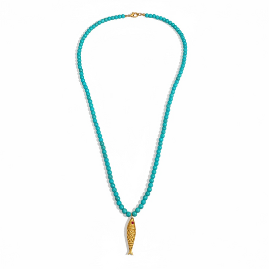 Turquoise bead necklace with gold pendant by Bote A Mano, featuring vibrant blue beads and 24K gold-plated detail.