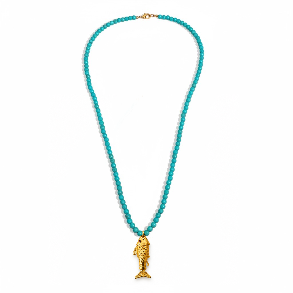 Turquoise bead necklace with gold pendant by Bote A Mano, featuring vibrant blue beads and 24K gold-plated detail.
